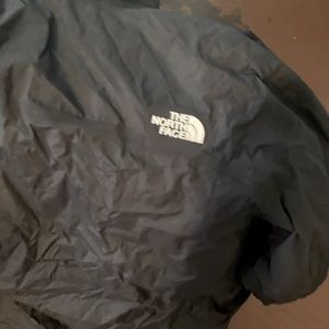 Black North Face rain jacket